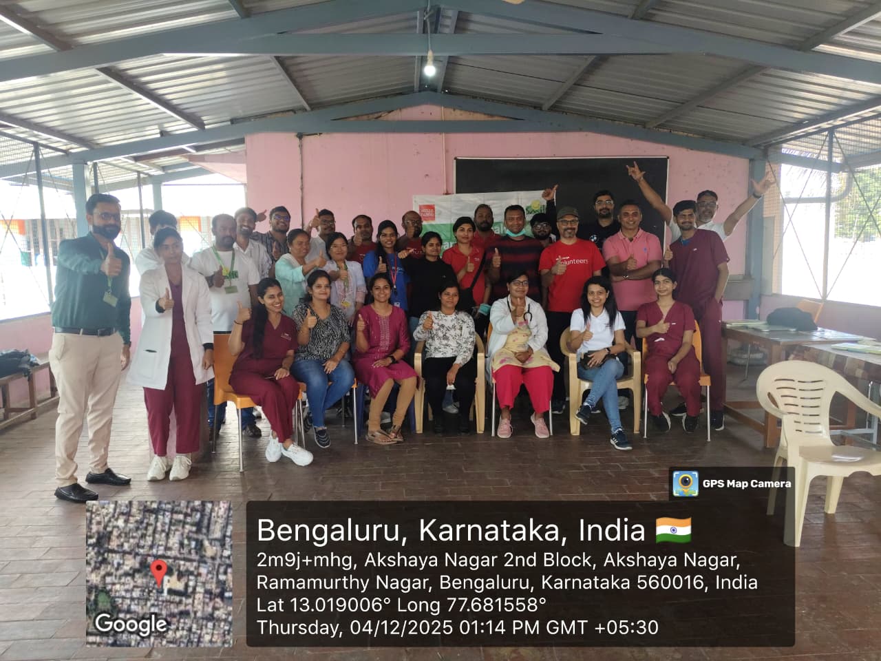 Group photo of the dental team and volunteers at the health camp